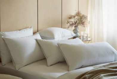 The Luxurious Comfort of White Goose Down Soft Pillows in Hotel Suites